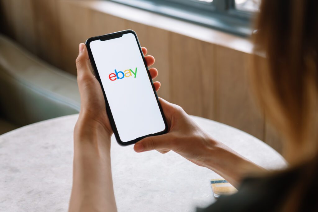 Joining a trend of Etsy, Walmart and others using OpenAI's ChatGPT, eBay is working with the AI platform to invest in agentic commerce. | Image credit: Nuttapong punna - Adobe Stock